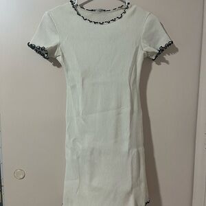 Zara Chic Cream Mini Dress with Black Accents